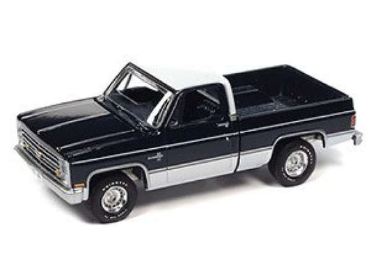 1985 Chevrolet Silverado, dark blue poly body with white lower & white roof